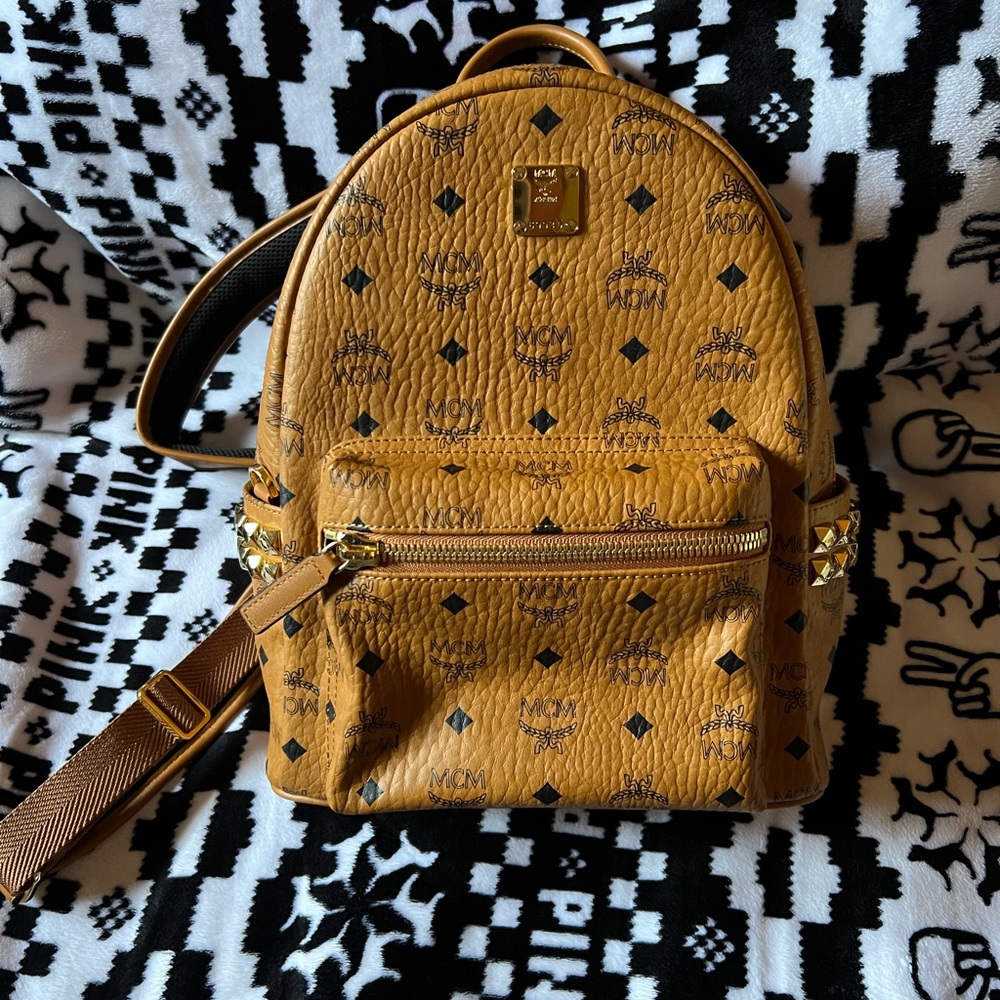 Authentic MCM studded small backpack cognac like new condition! Must go ✨